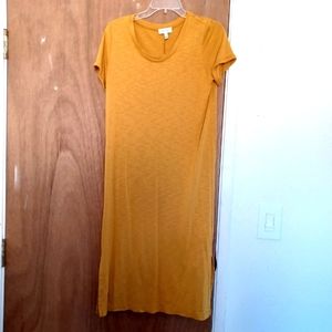 Free with any purchase. Mustard yellow midi dress